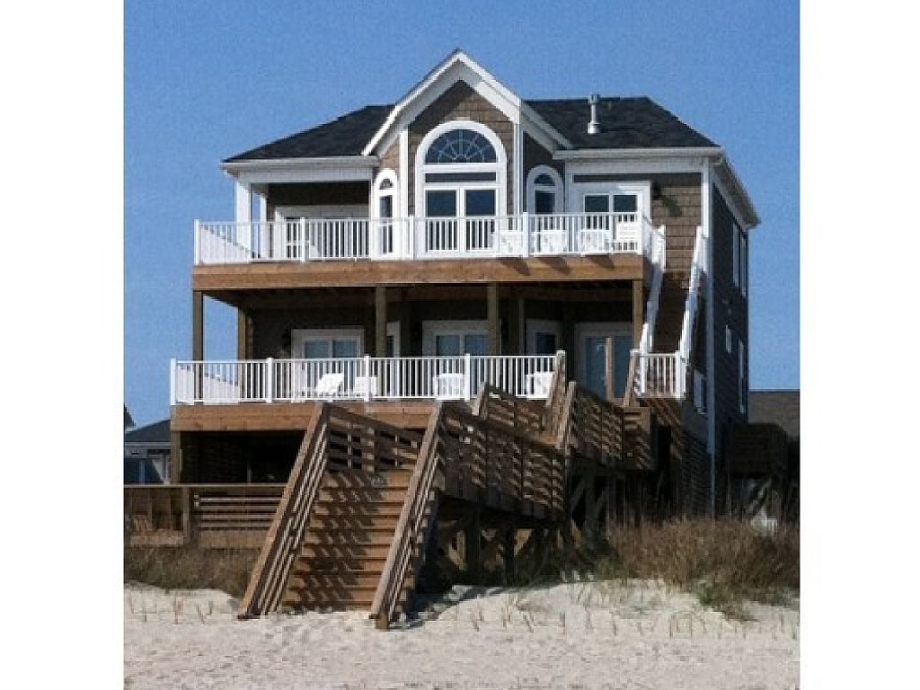 Beach Side view of oceanfront home. Private Boardwalk. Perfect for your wedding !!  Vacation rental home at Ocean Isle Beach NC